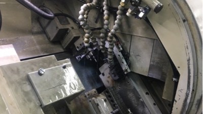 津上BO205走心机钻不锈钢1.2mm孔，可用大扭矩气动主轴加工